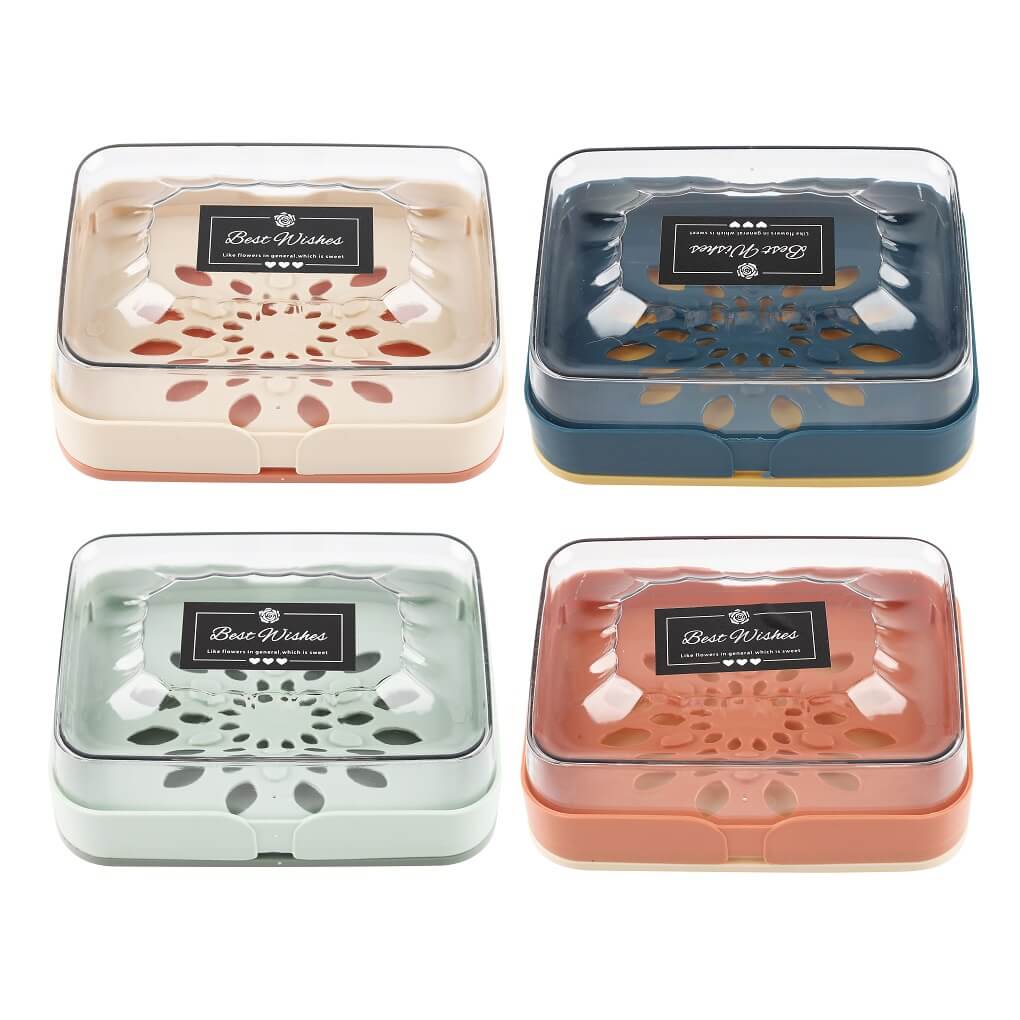 Assorted soap boxes in blue, orange, and green with black label on top.