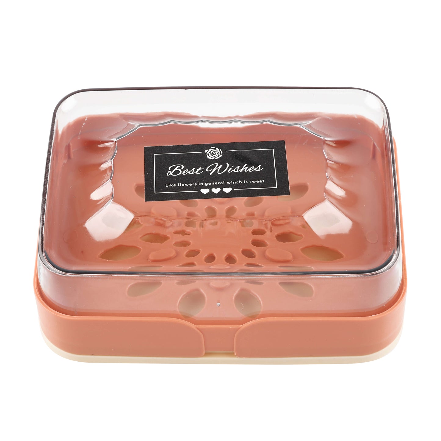 Close-up view of orange soap box with clear lid labeled “Best Wishes” and floral drainage design.