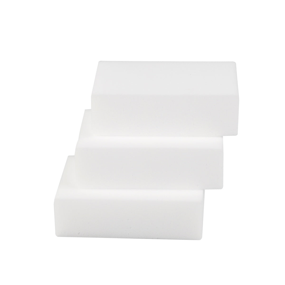 Group of white melamine foam sponges shown from side angle.